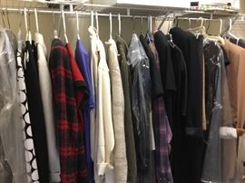 Three closets of ladies clothes