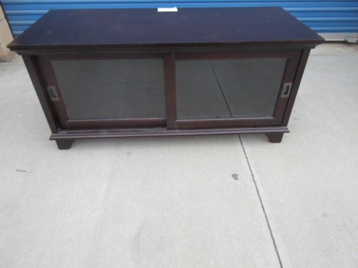 Low buffet / cabinet with sliding front doors