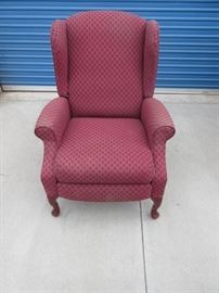 Red armed sitting chair