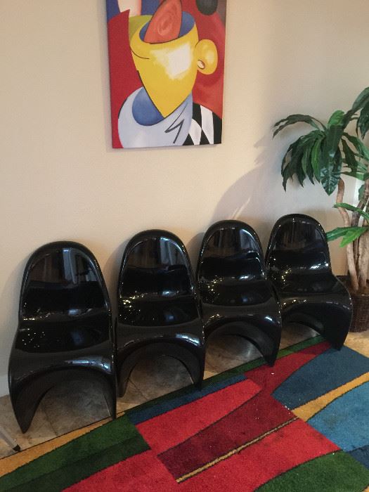 4  Black acrylic chairs