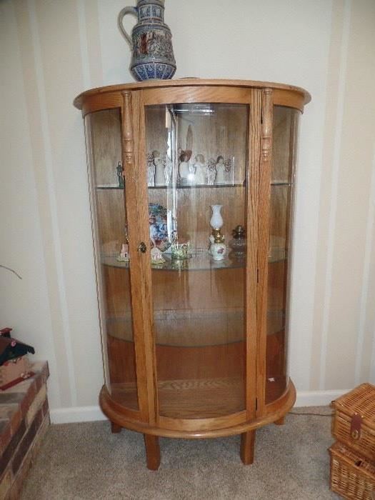  Vintage lighted cabinet with curved glass 