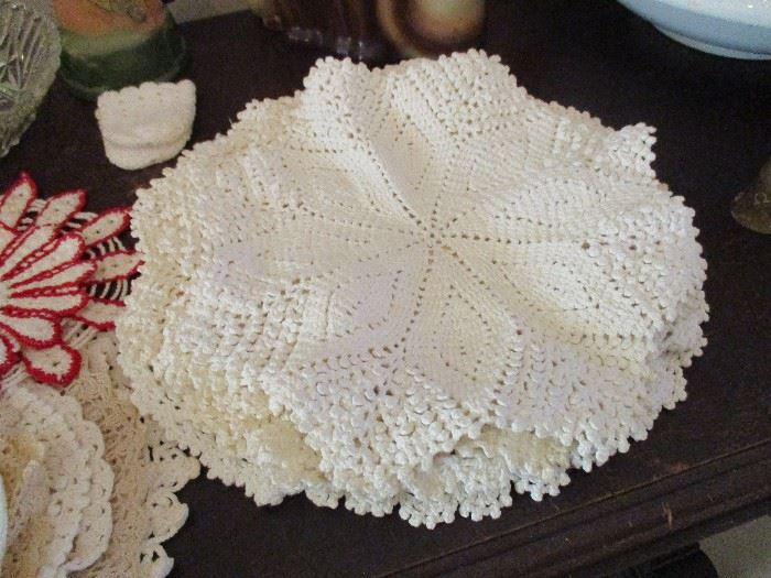 Large selection of hand made doilies