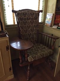 Early american chair with side table.