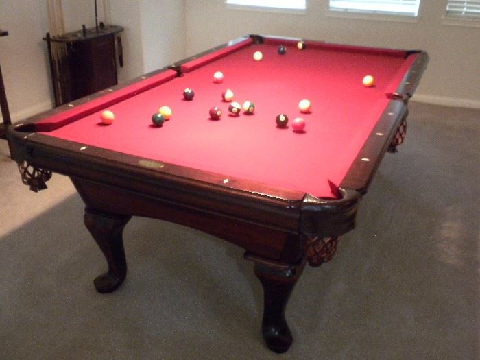  "Limited Edition" Highland Series regulation 8 ft. Simonis burgundy felt, Dark Mahogany finish with heavy leather pockets,  Aramith Belgian billard balls, overall dimensions 54" W x 99" L x 32" H made from Tulip wood and manufactured by AMF.