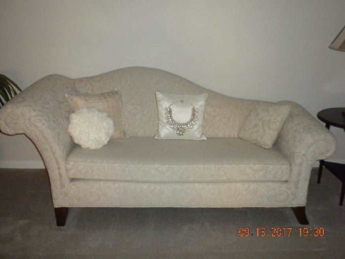 Fainting Couch, off white cream color fabric with floral design (82" W x 34" L x 35"H) 4 Cherry wood finish legs. Matches King Louis IV chair. Seldom used
