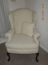 King Louis IV chair,  off white cream color fabric with floral design (33"W x 43"H x 31"L) matches fainting couch. Seldom used