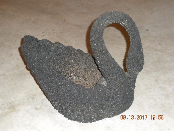 Black Swan planter made out of black pebbles