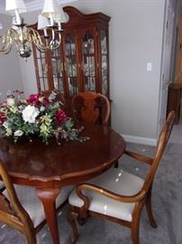 Dining room Queen Anne style dining room table, 6 chairs, and China cabinet. 