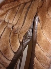 Fur with leather accent and trim