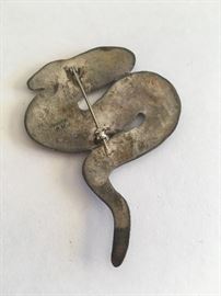 Sterling snake pin. Believed to be the work of Navajo artist Robert Johnson. 