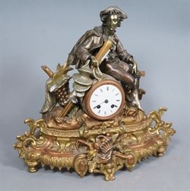 Lot 101 Vintage Ornate Figural Clock. Young lad with bask