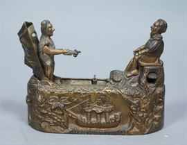 Lot 107 COLUMBUS Vintage Mechanical Bank. Indian with pea