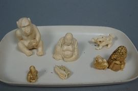 Lot 123 7pc Asian Carved Figures. Buddhas, carved monkey 
