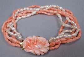 Lot 192 14K Yellow Gold Carved Coral Rose Bracelet. 6 str