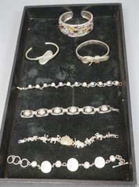 Lot 203 7 Sterling Silver Bracelets. 3 cuffs including wi