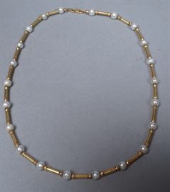 Lot 213 Italian 14K Gold Pearl Necklace. Small pearls wit