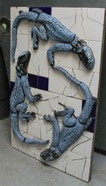 Tile Art Lizards CERAMIC MURAL by Michellino. This is a  3 dimensional ceramic mural / tile art by contemporary California artist Michel Petersen, who uses the artistic name Michellino. Mural depicts 3 blue lizards against a white background. This mural was originally installed as one of several murals in the historic Ventura Harbor (California), where Michel Petersen was the artist in residence 1998-2005. The murals were produced by her company Michellino Ceramics. During a recent renovation of the harbor buildings some of the previously installed murals were lost. This is the only one saved during the renovation, as it was the only one not permanently attached to the building. The mural measures about 32"wide x 48"high and the base is around 1"thick; the lizards protrude about 5" above the base. It is quite heavy. This art is made of ceramic, was intended for outdoor installation and made to withstand the elements. The colors are vibrant, looks like new. Perfect for indoor or outdoor