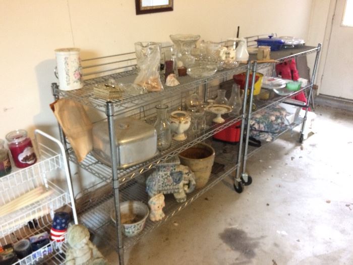 2 large steel rolling shelving carts, restaurant style, lots of glassware and nick-knacks