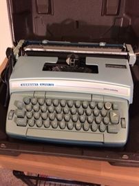 Vintage, in case Smith Corona Coronet typewriter, Super 12. Looks grey in this picture but it is blue