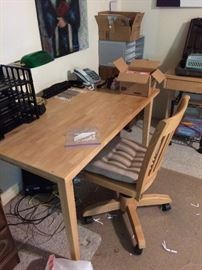 Small desk and matching chair, computer table to right