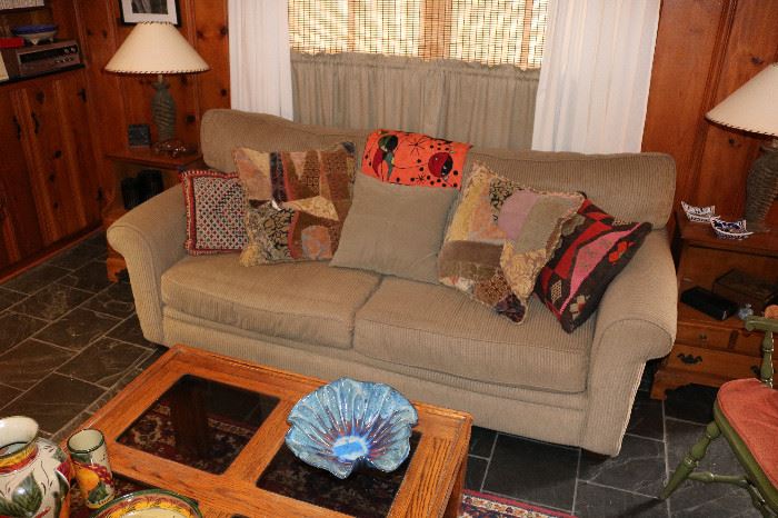 Great Corduroy Sofa, Oak & Glass Coffee Table, Dancing Rabbit Pottery Bowl, Talavera Pottery Pieces, Colorful Toss Pillows