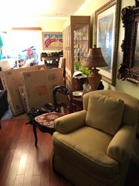 Stuffed chairs and wooden chairs