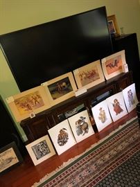 Large TV with large speakers and surround sound, prints