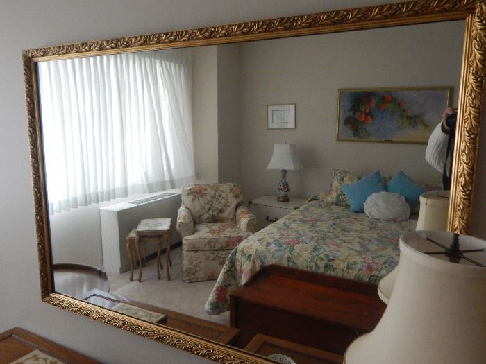 Large wall mirror in master bedroom.