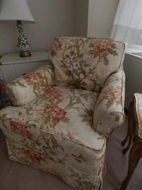 Large comfy chair in master bedroom.