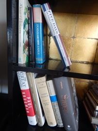 Book shelves with a small selection of history, political, and cookbooks.