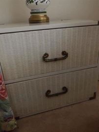 Older wicker chest of drawers.