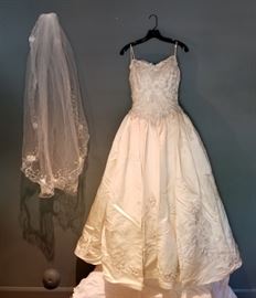 Priscilla of Boston custom wedding gown with veil 