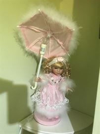 One of two identical doll lamps