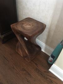 Rustic carved wood end tables.