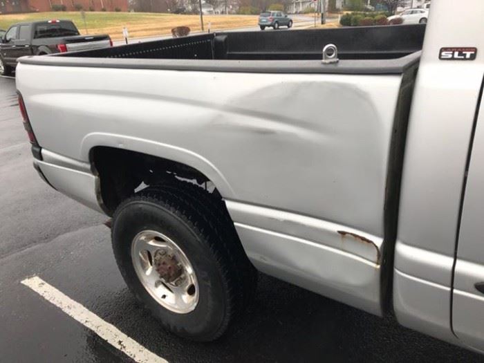 Has dent on box panel, Runs Well, Tires Good, Drivers side window not working, Dashboard cracked,  Radio works but does not display Time or station 
