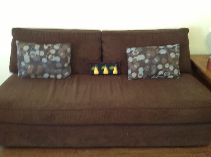 Second sofa has matching chair and ottoman.