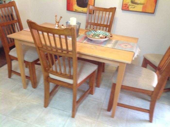 Dining table and five chairs.