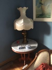 Marble top round walnut table with lamp