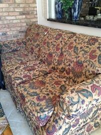 Three cushioned sofa