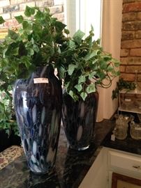 Two of three matching blue vases