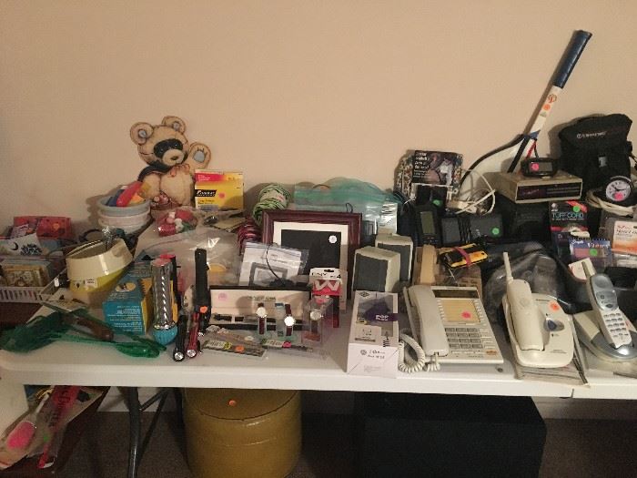 Electronics, phones, old rotary phones, newer cordless phones, answering machines, digital picture frames, timex wristwatches, alarm clocks, clock radios, portable radio players, Garmin GPS, GPS Mapping software, Walkie Talkies, computer speakers, hand-held tape recorder, vintage tennis racket, cameras, etc.
