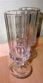 1876 CENTENNIAL GLASSES - EARLY AMERICAN PATTERN. THESE GLASSES ARE 142 YEARS OLD. WE HAVE ONLY ONE PAIR ! ONE IS CRYSTAL CLEAR, THE OTHER HAS A BIT OF HAZE AT THE BOTTOM. NEVERTHELESS THEY ARE SUCH AN ASWESOME FIND.