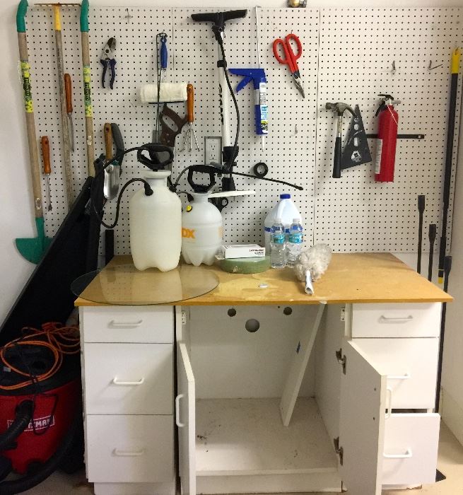 hand tools, storage cupboard,  2 gallon canister sprayer, heavy duty bicycle pump, garden tools