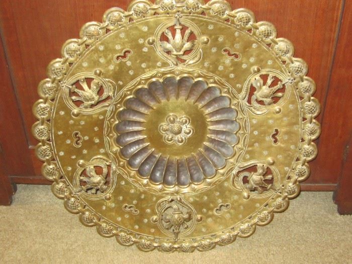 large brass hanging plate