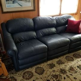 Navy leather reclining sofa...