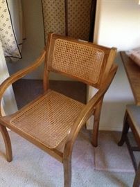 THERE ARE A PAIR OF THESE CANE CHAIRS