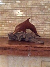 Wood dolphin figurine