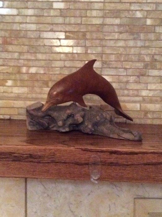 Wood dolphin figurine
