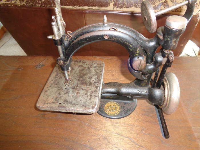 vintage 1881 sewing machine w/top in refinished walnut cabinet