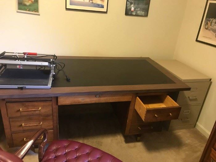 #19	mid-century desk w/laminate top 72x36x28  7 drawers	 $75.00 
